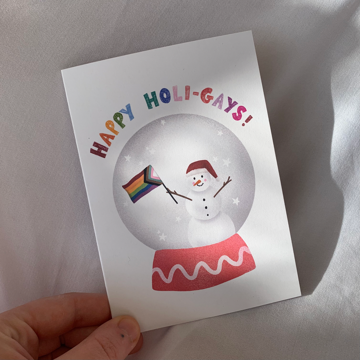 Happy Holi-gays LGBTQ+ Christmas greetings with envelope